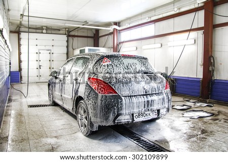 ASHA, RUSSIA - JANUARY 19, 2012: Motor car Peugoet 308 at the car wash service station.