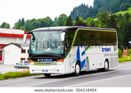 VALAIS, SWITZERLAND - JULY 29, 2014: Modern interurban coach Setra S415HD at the intercity freeway.