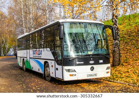 UFA, RUSSIA - OCTOBER 23, 2011: Interurban coach Mercedes-Benz Turk O560 Intouro at the city street.