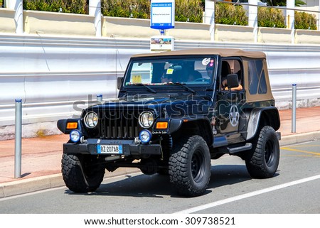 MENTON, FRANCE - AUGUST 2, 2014: Motor car Jeep Wrangler at the city street.