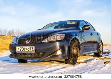 NOVYY URENGOY, RUSSIA - SEPTEMBER 28, 2014: Motor car Lexus IS250 at the countryside.