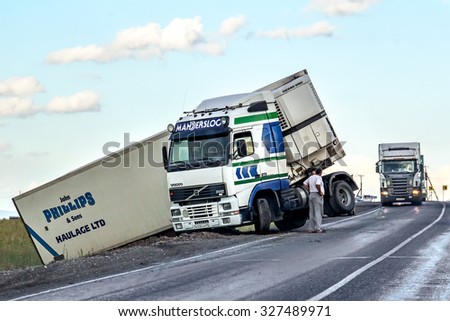 BASHKORTOSTAN, RUSSIA - JULY 12, 2015: Semi-trailer truck Volvo FH12 crashed at the interurban freeway.