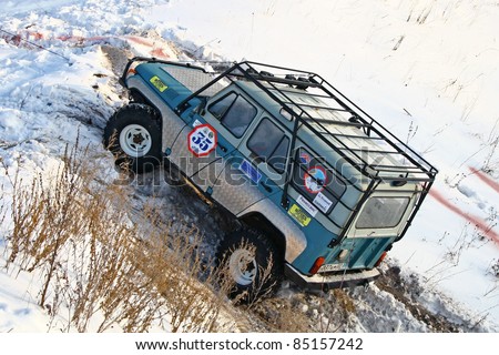 UFA, RUSSIA - DECEMBER 18: Off-road vehicle UAZ #35 of team ROTAS during annual trophy raid Natural selection on December 18, 2010 in Ufa, Russia.