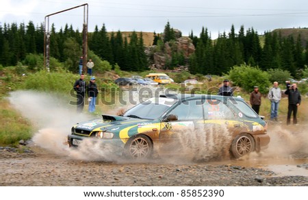 BAKAL, RUSSIA - AUGUST 8: Evgeniy Klimov\'s Subaru Impreza (No. 36) competes at the annual Rally Southern Ural on August 8, 2009 in Bakal, Satka district, Chelyabinsk region, Russia.