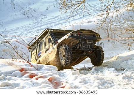 UFA, RUSSIA - DECEMBER 18: Off-road vehicle UAZ (No. 199) of team ROTAS during annual trophy raid Natural selection on December 18, 2010 in Ufa, Russia.