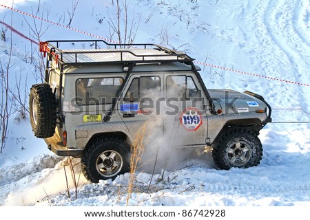 UFA, RUSSIA - DECEMBER 18: Off-road vehicle UAZ (No. 199) of team ROTAS during annual trophy raid Natural selection on December 18, 2010 in Ufa, Russia.