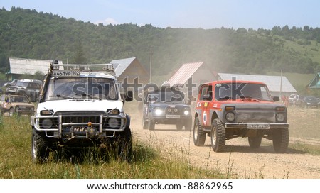 PAVLOVKA, RUSSIA - JUNE 26: Competitors\' off-road vehicles Lada Niva takes part at the annual trophy challenge \