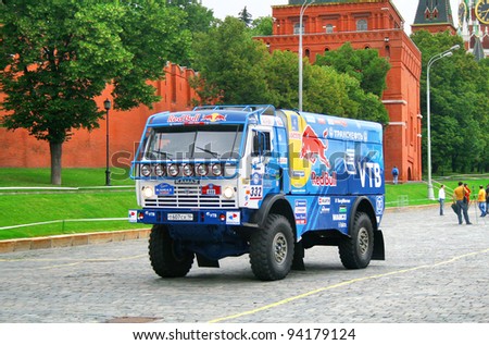MOSCOW, RUSSIA - JULY 10: Anton Shibalov\'s KamAZ-4326 (No. 332, team KAMAZ Master) competes at the annual Rally Silkway - Dakar series on July 10, 2011 on the Red Square, Moscow, Russia.