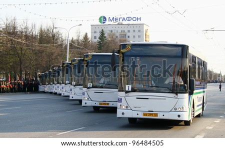 UFA, RUSSIA - MAY 4: Buses for conveyance of veterans of World War II takes part at the dress rehearsal of Victory Parade on May 4, 2010 in Ufa, Russia.