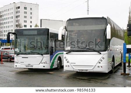 UFA, RUSSIA - MAY 11: Coach NEFAZ 52999 (VDL Mistral) and city bus NEFAZ 52998 (VDL Transit) exhibited at the annual Motor show \