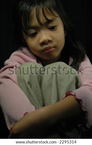 stock photo : Little girl sitting alone