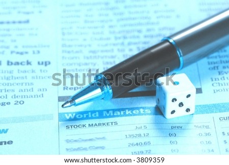 World markets report, pen and a dice, in blue tone