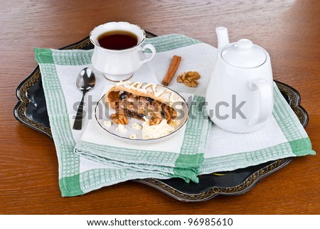 Breakfast with the apple strudel with tea
