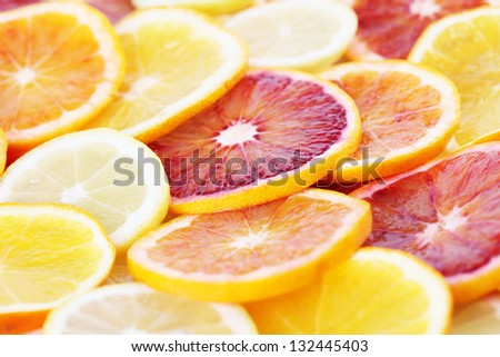 Beautiful background made of colorful citrus fruit slices