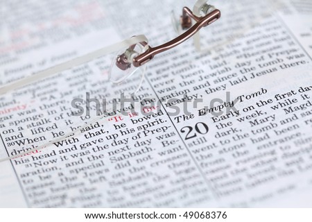 Empty tomb - Open Bible with selective focus on the text in John 20 about Jesus\' resurrection. Shallow DOF
