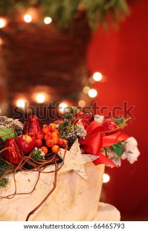 Elegant Christmas decoration with red berries on background with Christmas lights
