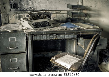 Image of a destroyed office in a derelict abandoned police station.