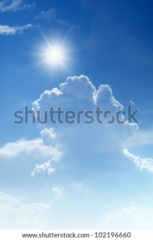 Peaceful background - bright sun, blue sky, white clouds - heaven
