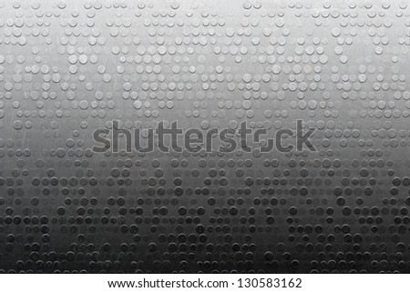 Gray metallic scratched textured stainless steel panel