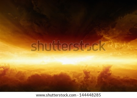 Abstract scenic background - dark red clouds, bright glowing horizon