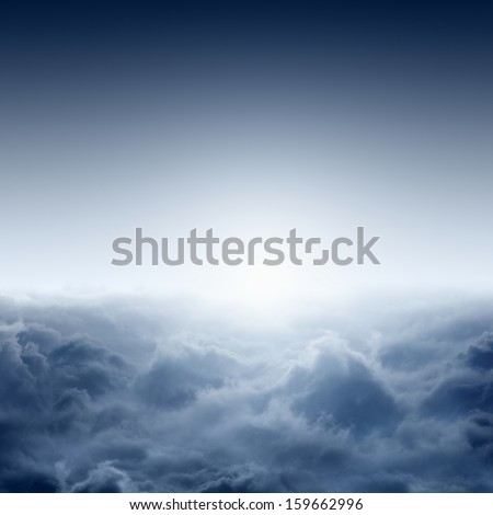 Beautiful misty sunrise from aerial view, view on clouds from above, bright sun