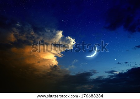 Tranquil background - beautiful romantic sunset, big glowing cloud, moon and bright stars in dark blue sky. Elements of this image furnished by NASA