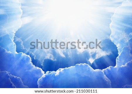 Peaceful background - beautiful blue sky with bright sun, light from heaven