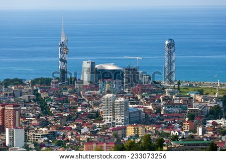 BATUMI, GEORGIA - SEPTEMBER 7: Aerial view of seaside city on Black Sea coast, high landmark building of Batumi Technological University and Alphabet Tower on September 9, 2014 in Batumi, Georgia.
