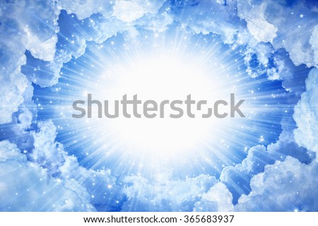 Beautiful peaceful background - beautiful blue skies with bright light from above, light from heaven