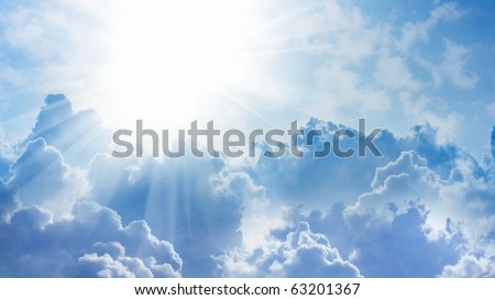 16x9 wide-screen aspect ratio background - light from heaven. Sun and clouds.