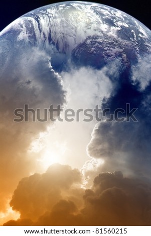 Planet Earth in space, sky with clouds and bright sun