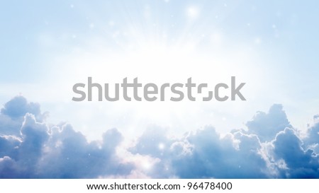 Peaceful background - bright sun, blue sky, white clouds - heaven