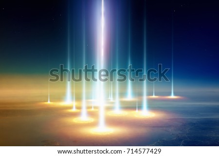 Sci-fi background - planet Earth is attacked by extraterrestrial spacecraft, UFO shoots powerful beam weapon.