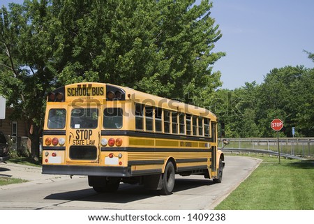 School Bus on it\'s route taking children home in the afternoon.