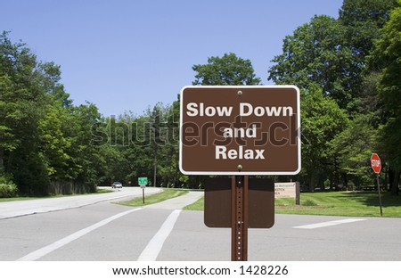 Slow Down and Relax - Roadside sign in Park