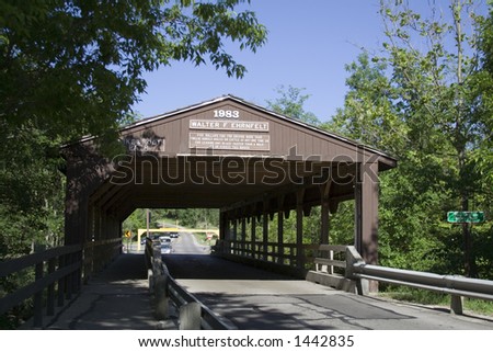 Covered bridge - dedicated.  Sign warns of $5.00 fine for driving too many cattle at once, etc.  Shot RAW not sharpened