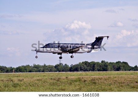 Small Continental Connection jet landing at Cleveland Hopkins Airport, USA.
