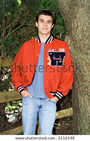 A high-school senior in his school varsity letter jacket.