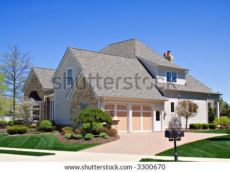 A gorgeous Ohio home - front side view - beautiful landscaping.