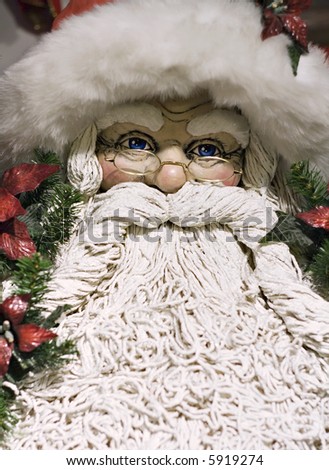 A decorative Santa Clause - shallow depth of field - focus on eyes.
