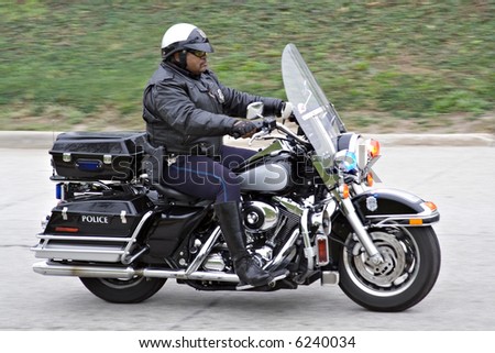 A Cleveland Ohio motorcycle police officer in action.