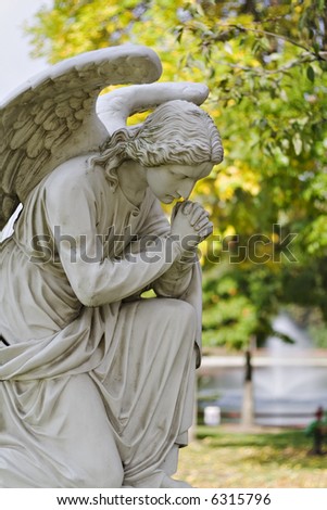 Garden Statues Angels on Statue Of An Angel In A Garden Praying  Stock Photo 6315796