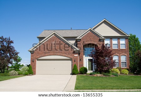 stock photo A large brick house in the suburbs in Ohio USA
