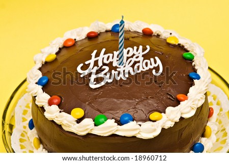 Chocolate Birthday Cake on Stock Photo   Chocolate Birthday Cake With Candle On Yellow Background