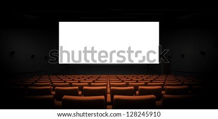 Empty modern cinema with blank white screen
