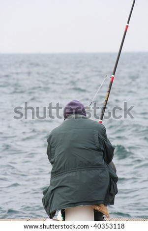 older Man sea fishing
