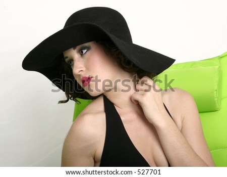 Young woman with old fashioned hat