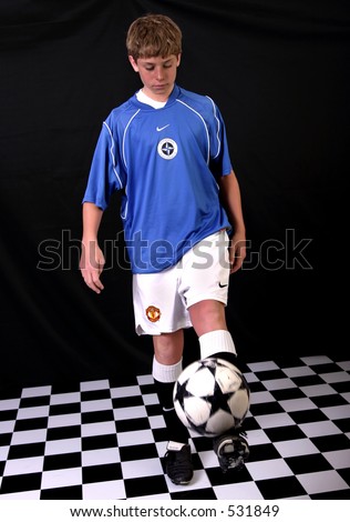 Teenage boy in soccer uniform