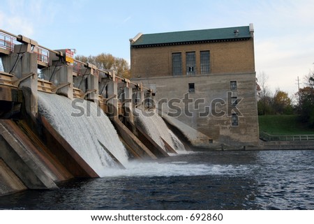 Water flowing over electric dam