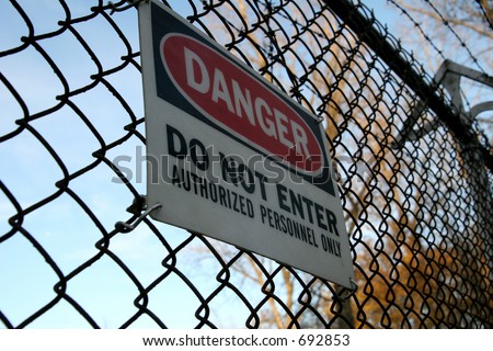 Danger, do not enter sign on fence